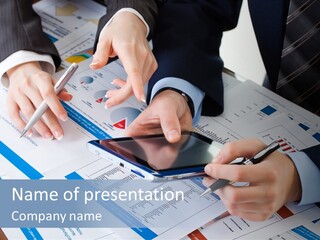 A Group Of People Sitting At A Table With A Tablet PowerPoint Template