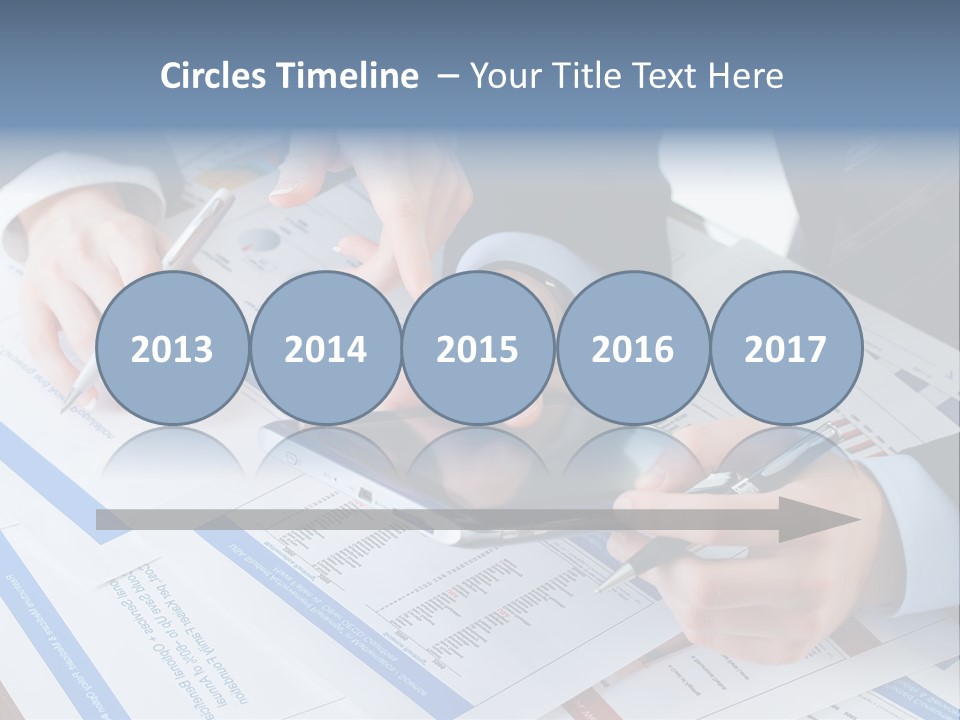 A Group Of People Sitting At A Table With A Tablet PowerPoint Template