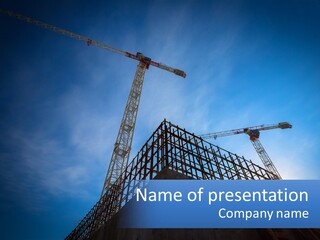 A Crane On Top Of A Building With A Blue Sky In The Background PowerPoint Template