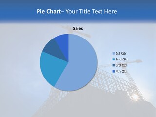 A Crane On Top Of A Building With A Blue Sky In The Background PowerPoint Template