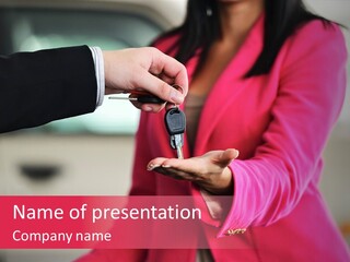 A Person Handing A Car Key To Another Person PowerPoint Template
