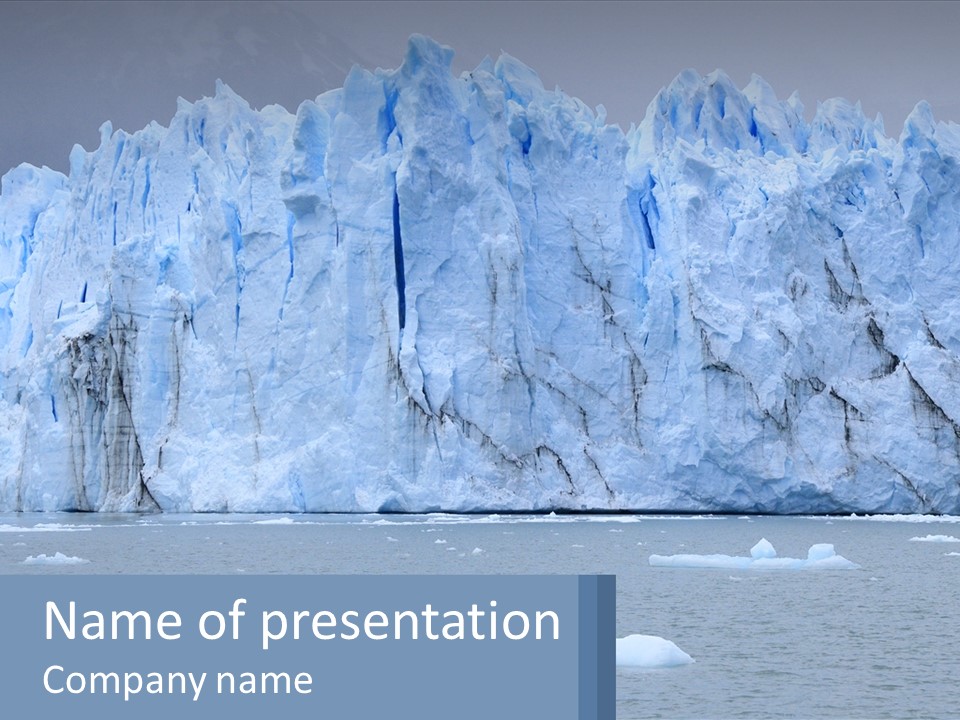 A Large Iceberg In The Middle Of A Body Of Water PowerPoint Template