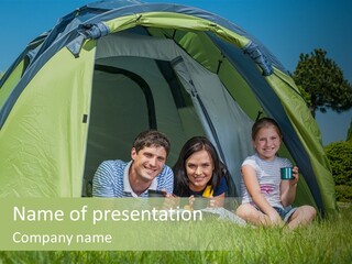 A Group Of People Sitting Inside Of A Green Tent PowerPoint Template