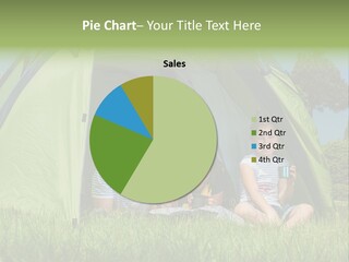 A Group Of People Sitting Inside Of A Green Tent PowerPoint Template