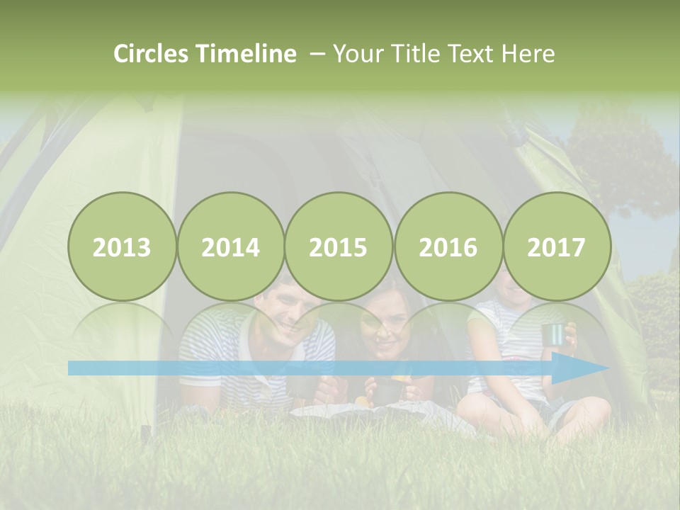 A Group Of People Sitting Inside Of A Green Tent PowerPoint Template