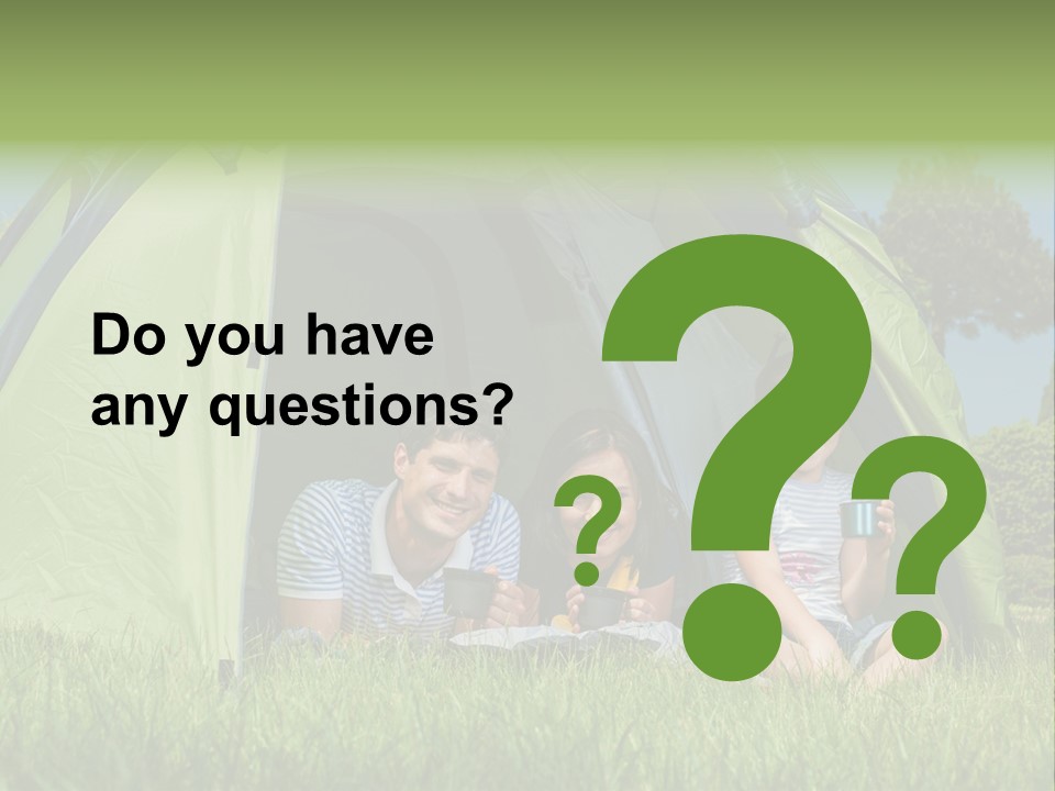 A Group Of People Sitting Inside Of A Green Tent PowerPoint Template