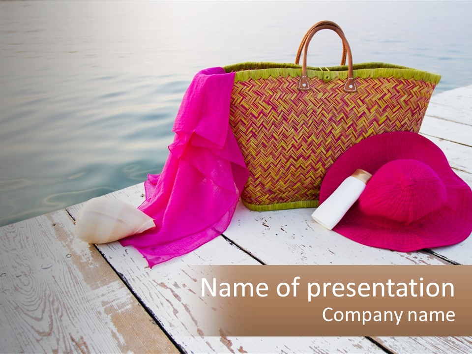 A Pink Hat And A Straw Bag On A Dock PowerPoint Template