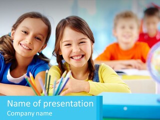 Two Young Girls Are Sitting At A Desk With Pencils PowerPoint Template