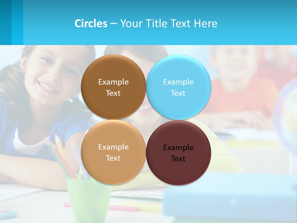 Two Young Girls Are Sitting At A Desk With Pencils PowerPoint Template