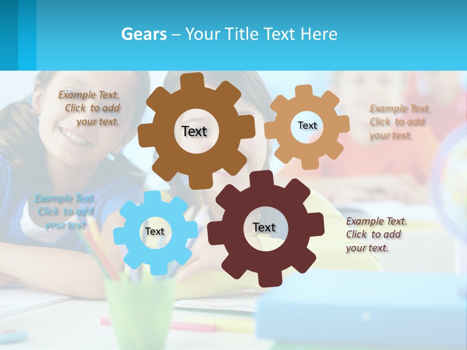 Two Young Girls Are Sitting At A Desk With Pencils PowerPoint Template