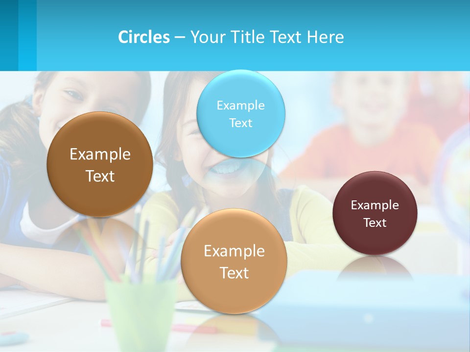 Two Young Girls Are Sitting At A Desk With Pencils PowerPoint Template