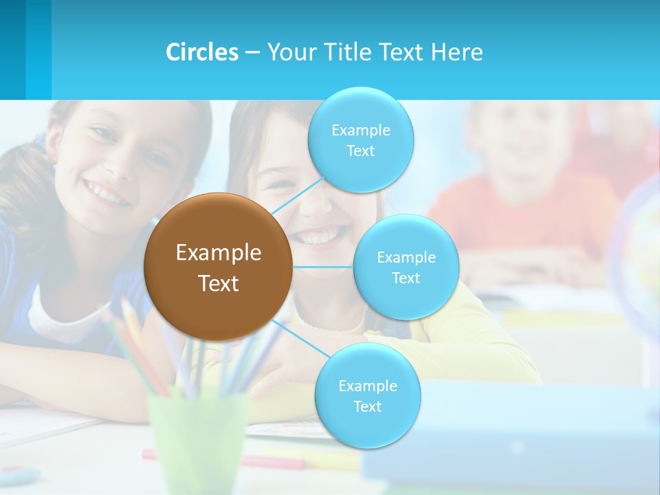 Two Young Girls Are Sitting At A Desk With Pencils PowerPoint Template