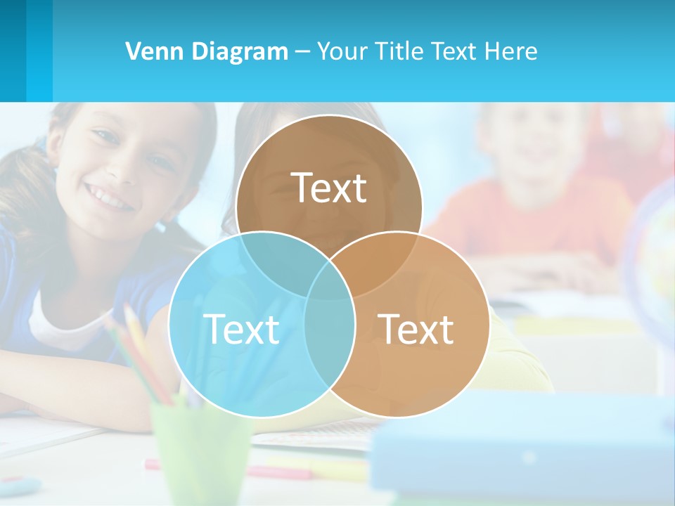 Two Young Girls Are Sitting At A Desk With Pencils PowerPoint Template