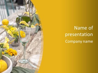 A Wooden Table Topped With Yellow Flowers And Wine Glasses PowerPoint Template