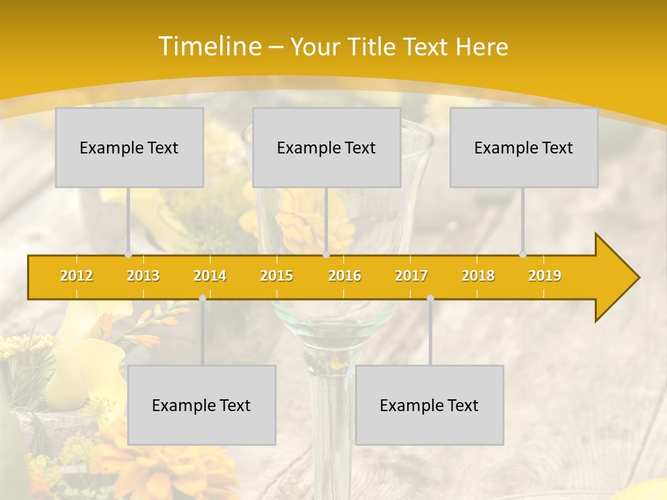 A Wooden Table Topped With Yellow Flowers And Wine Glasses PowerPoint Template