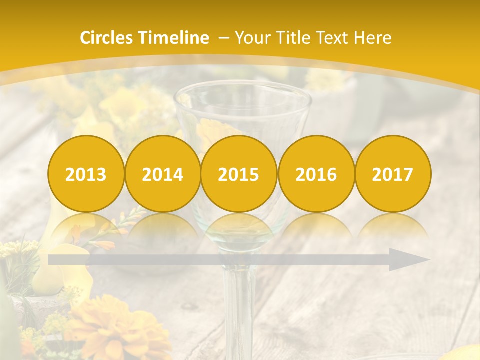 A Wooden Table Topped With Yellow Flowers And Wine Glasses PowerPoint Template