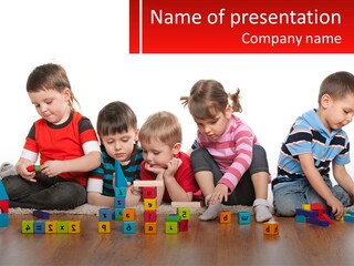 A Group Of Children Playing With Blocks On The Floor PowerPoint Template