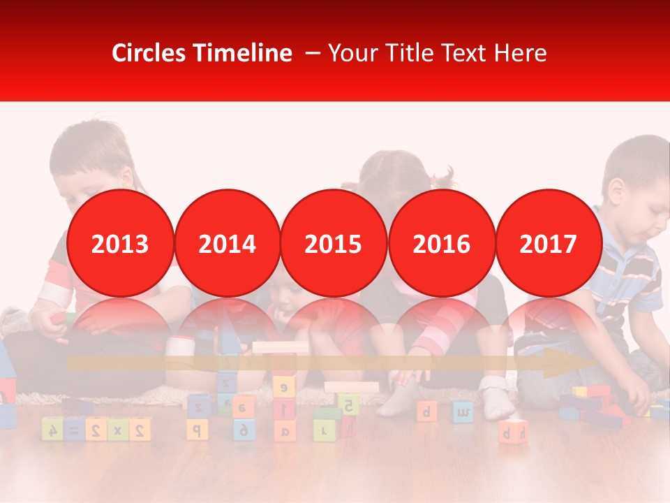A Group Of Children Playing With Blocks On The Floor PowerPoint Template