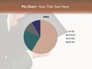 A Person In A Suit Holding A Tablet Computer PowerPoint Template