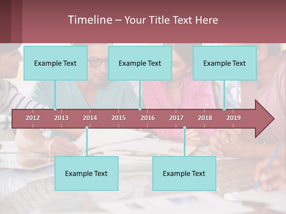 A Group Of People Sitting Around A Table Writing PowerPoint Template