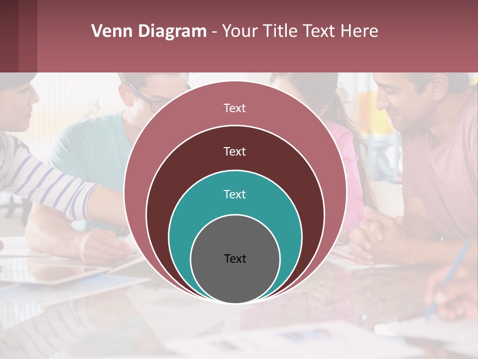 A Group Of People Sitting Around A Table Writing PowerPoint Template