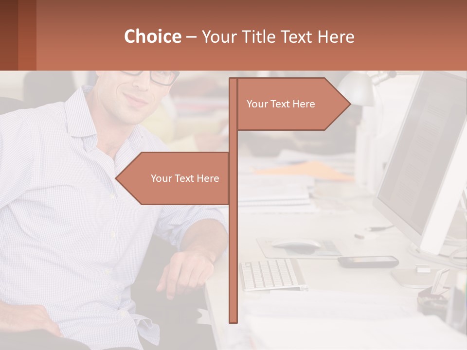 A Man Sitting At A Desk In Front Of A Computer PowerPoint Template