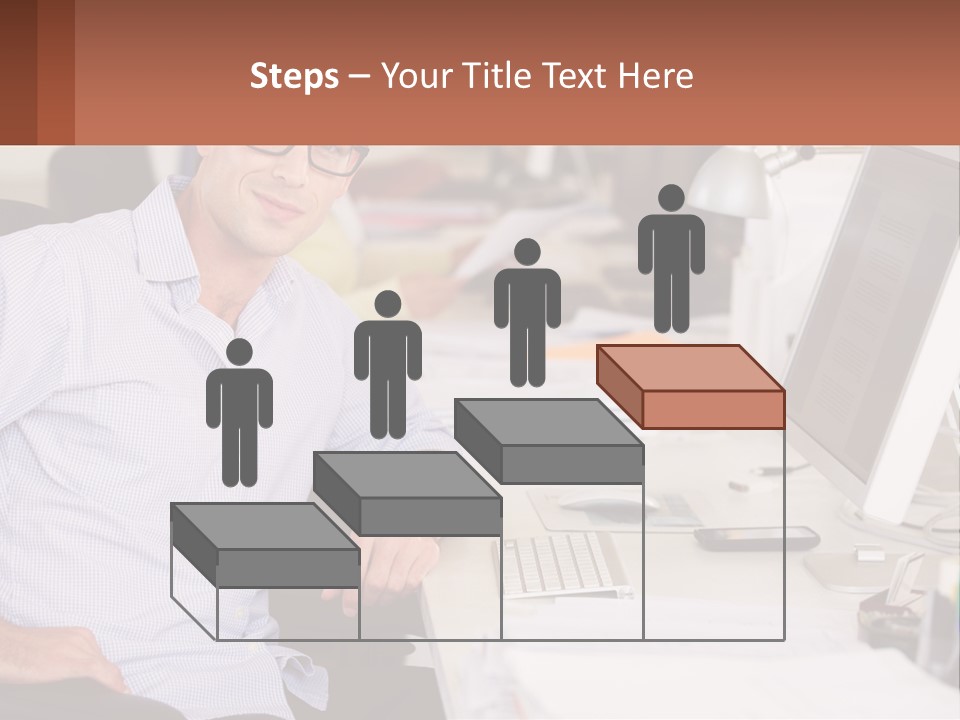 A Man Sitting At A Desk In Front Of A Computer PowerPoint Template