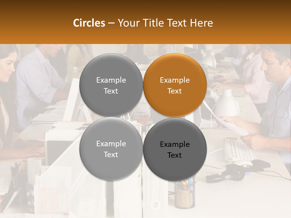 A Group Of People Working On Computers In An Office PowerPoint Template