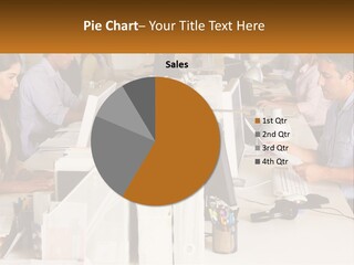 A Group Of People Working On Computers In An Office PowerPoint Template