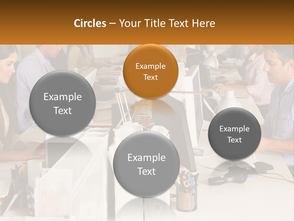 A Group Of People Working On Computers In An Office PowerPoint Template