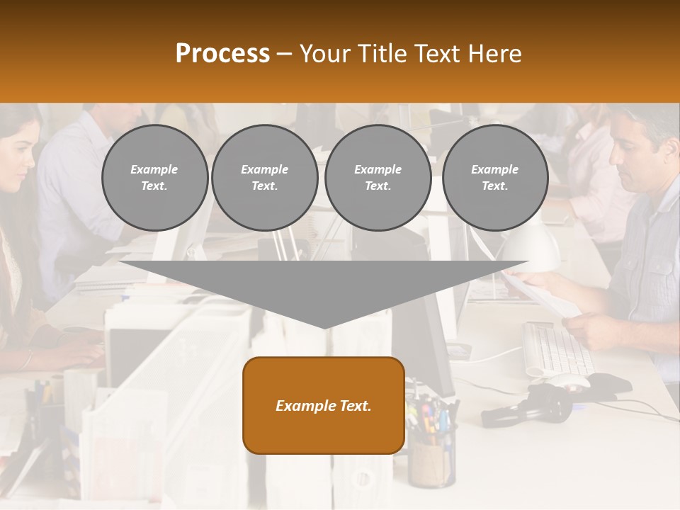 A Group Of People Working On Computers In An Office PowerPoint Template