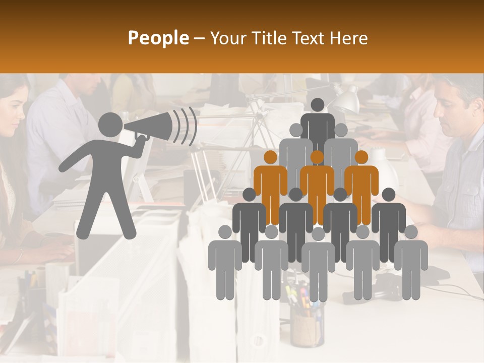 A Group Of People Working On Computers In An Office PowerPoint Template