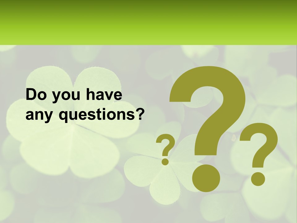 A Group Of Four Leaf Clovers With A Green Background PowerPoint Template