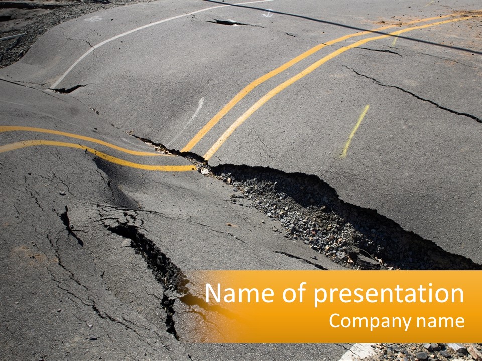 A Cracked Road With A Yellow Line On It PowerPoint Template