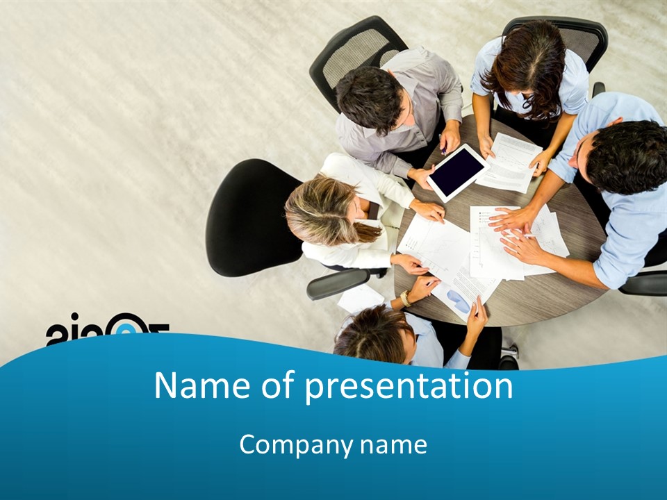 A Group Of People Sitting Around A Table With Papers PowerPoint Template