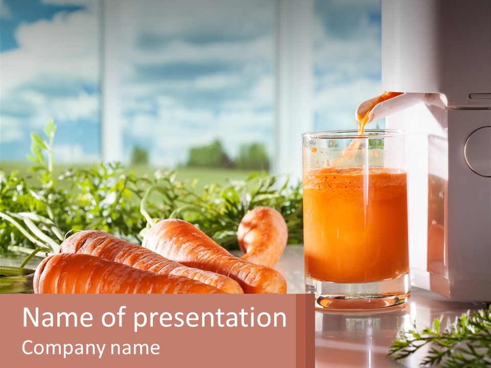 A Glass Of Juice Next To Carrots On A Table PowerPoint Template