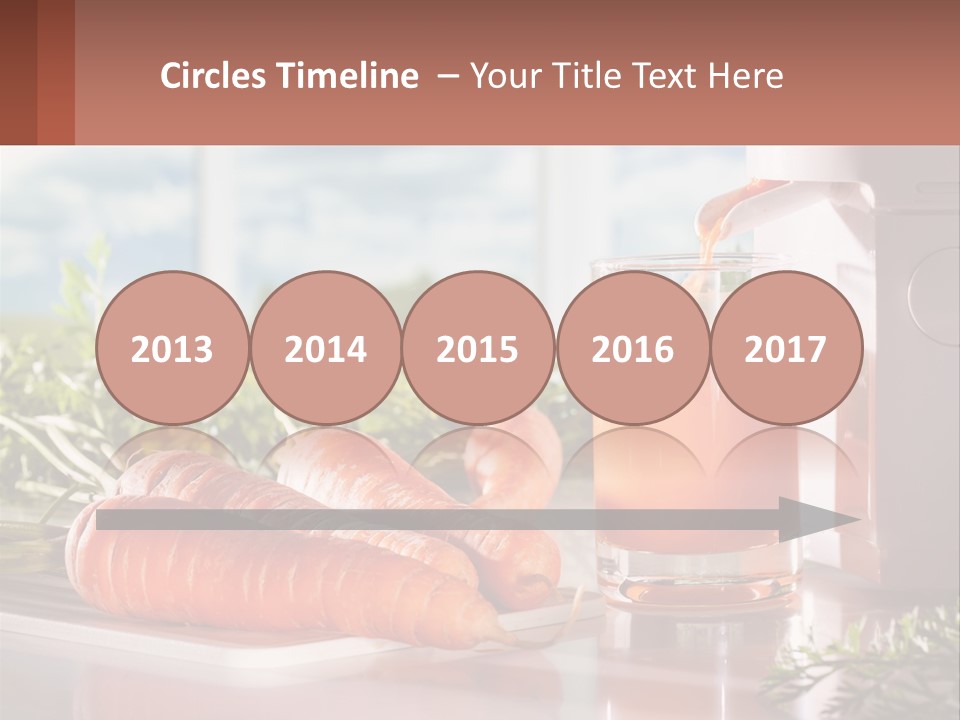 A Glass Of Juice Next To Carrots On A Table PowerPoint Template