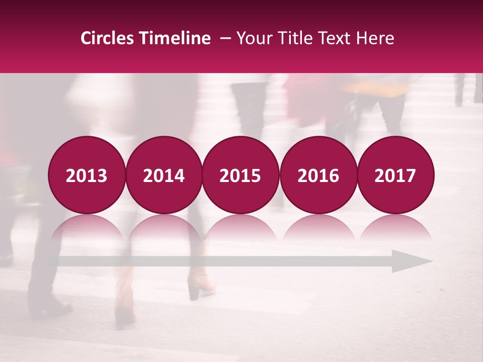 A Group Of People Walking Across A Street PowerPoint Template