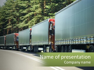 A Semi Truck Driving Down A Road With Trees In The Background PowerPoint Template