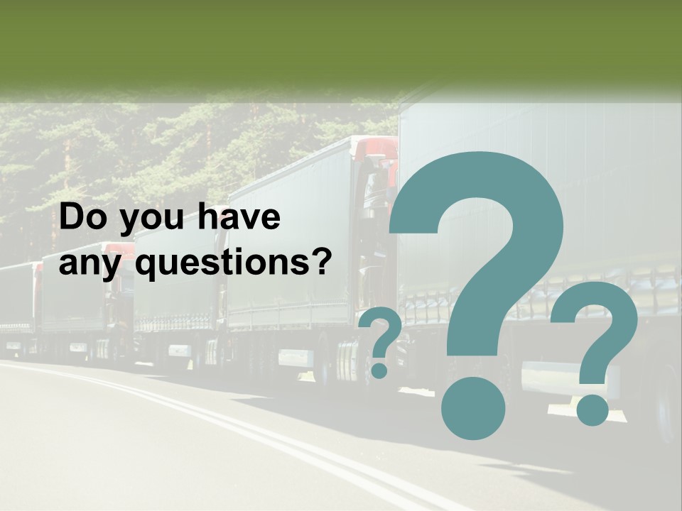 A Semi Truck Driving Down A Road With Trees In The Background PowerPoint Template