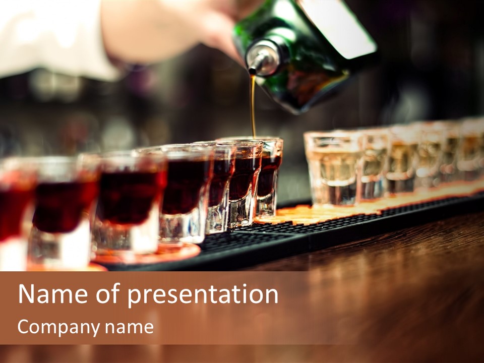 A Person Pouring A Beverage Into A Row Of Glasses PowerPoint Template