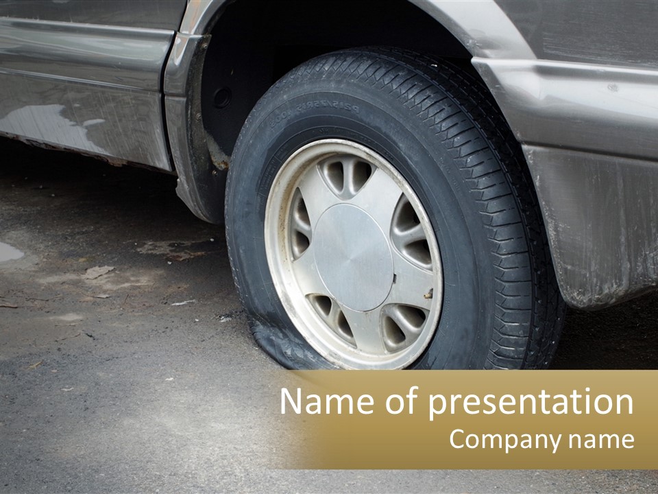 A Silver Car Is Parked On The Street PowerPoint Template