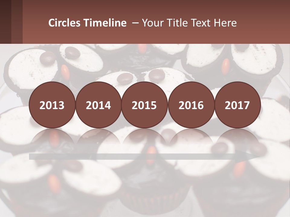 A Plate Of Chocolate Cupcakes With White And Brown Frosting PowerPoint Template
