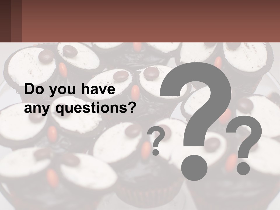 A Plate Of Chocolate Cupcakes With White And Brown Frosting PowerPoint Template