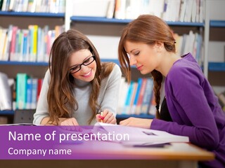 Two Girls Are Writing In A Book In A Library PowerPoint Template