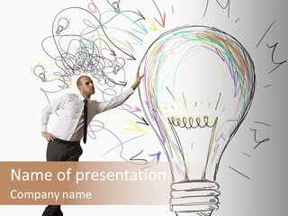 A Man Drawing A Light Bulb On A Wall PowerPoint Template