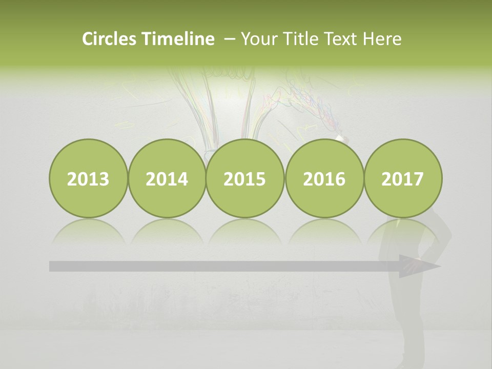 A Man Drawing A Light Bulb On A Wall PowerPoint Template