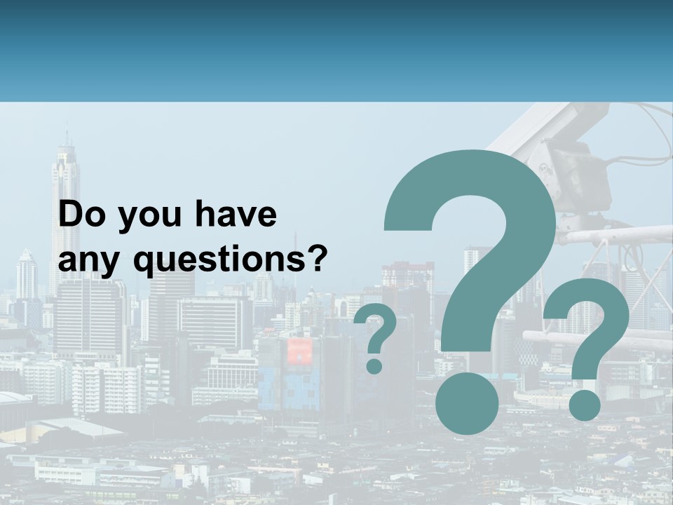 A Security Camera On Top Of A Building In A City PowerPoint Template