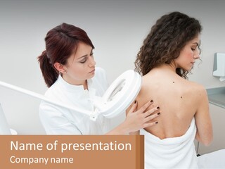 A Woman Getting Her Back Examined By A Doctor PowerPoint Template