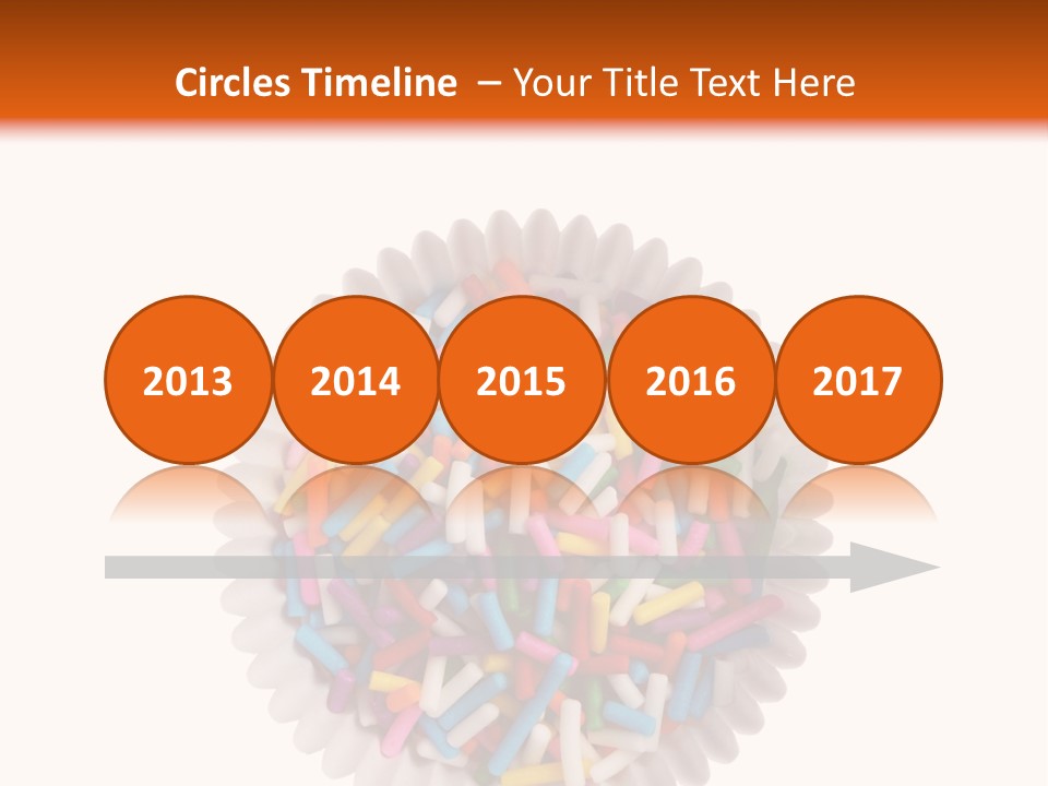 A Cup Full Of Colorful Sprinkles On A White Background PowerPoint Template